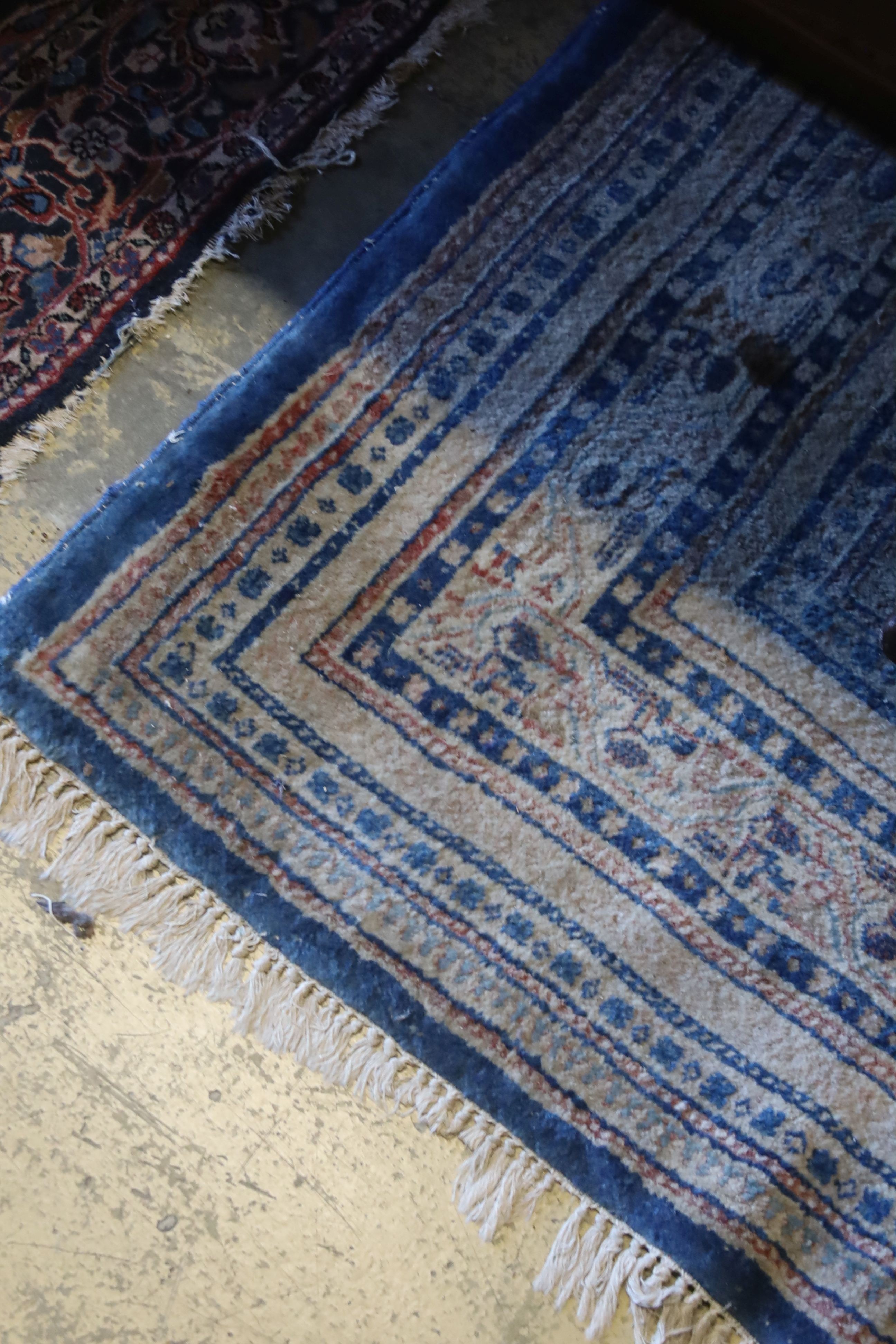 A Tabriz blue ground carpet